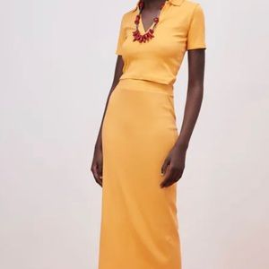 Yellow cropped polo top